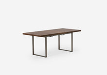 Hatch Dining Table in Walnut extends from 59 inch to 75 inch