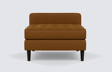 The EQ3 Reverie Extended Seat is a modern take on the mid-century style, with its button-tufted seating and back. The Classic Sahara leather chair is ready to ship, so you can enjoy it as soon as possible.  Custom Made in Canada Available in Grade 200 Classic Sahara with Black Ash legs. Available at StudioYDesign, 520 Herald St. Victoria BC