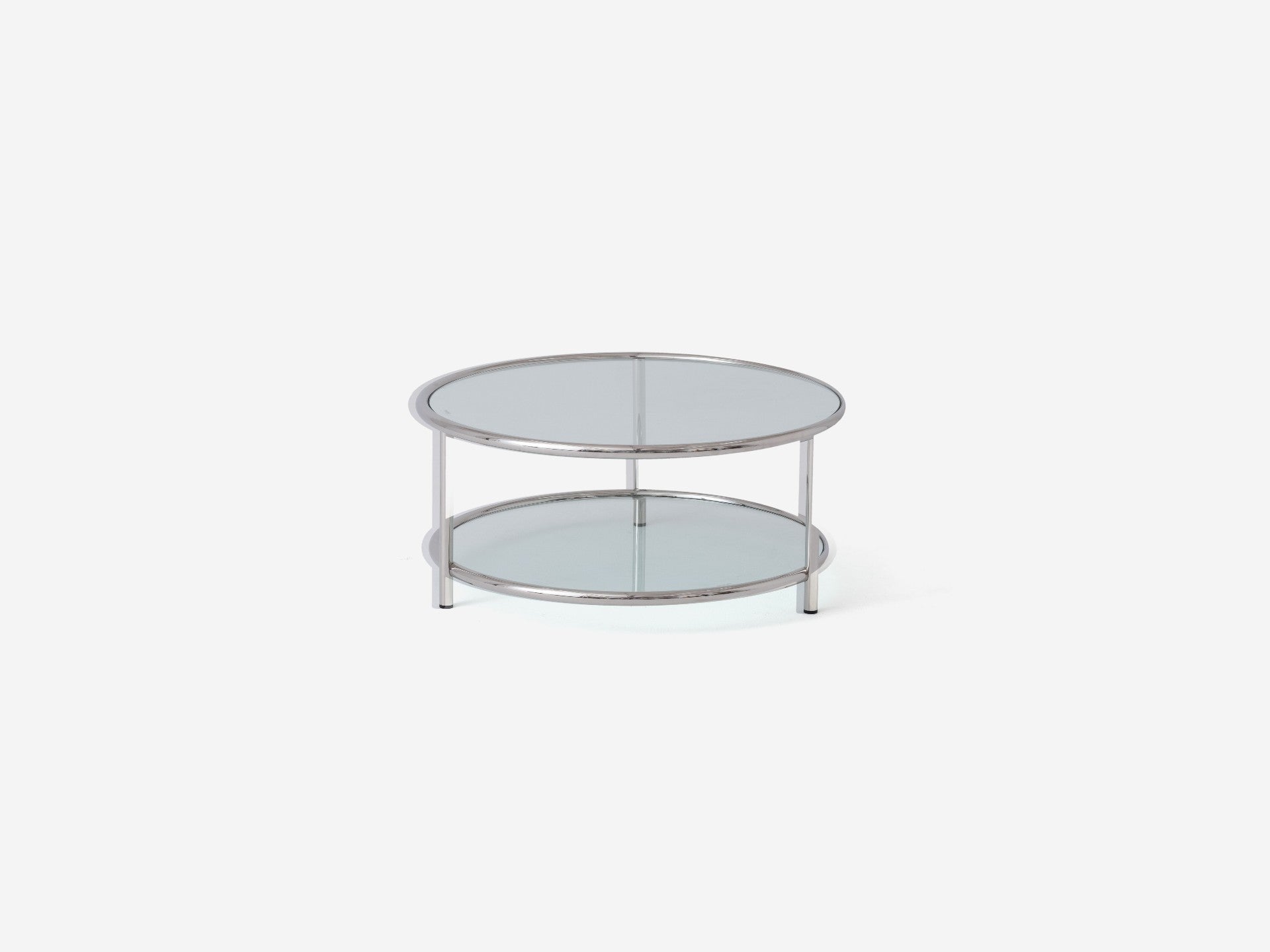 Fun, versatile, and perfect for small-space living, the Tubular tables feature steel frames with glass tabletops. The Tubular coffee table is available in two sizes: round or oval. Choose from a black frame with grey glass or stainless steel frame with clear glass.
